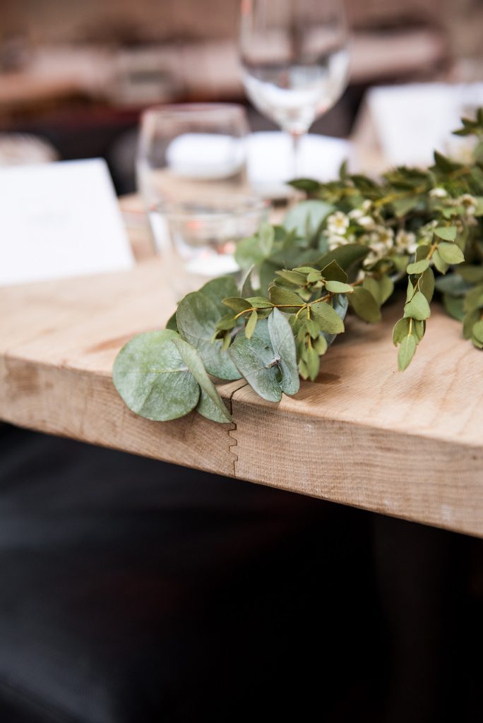 Green botanical table runners for Marlow wedding