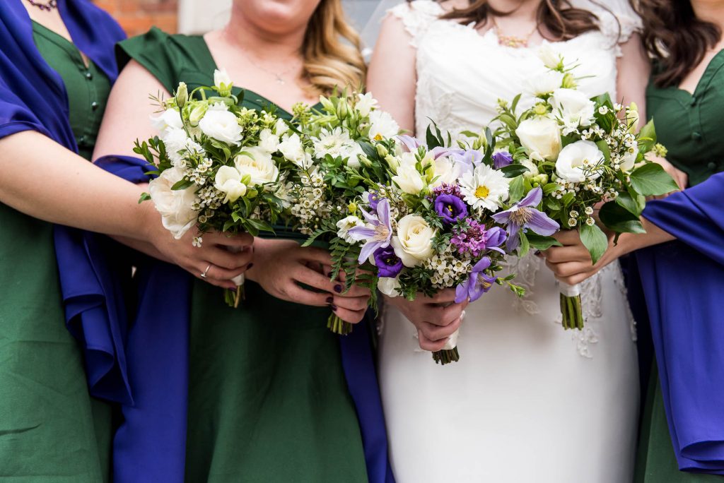 Bridal bouquets together in a line