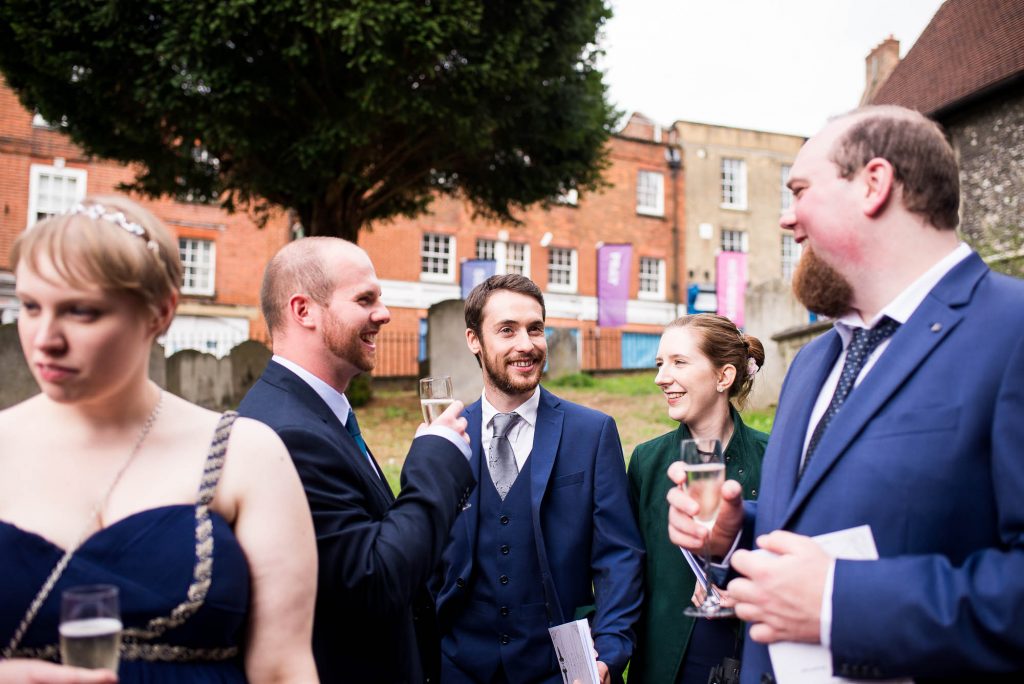 Candid and documentary style photography capturing guests at the reception