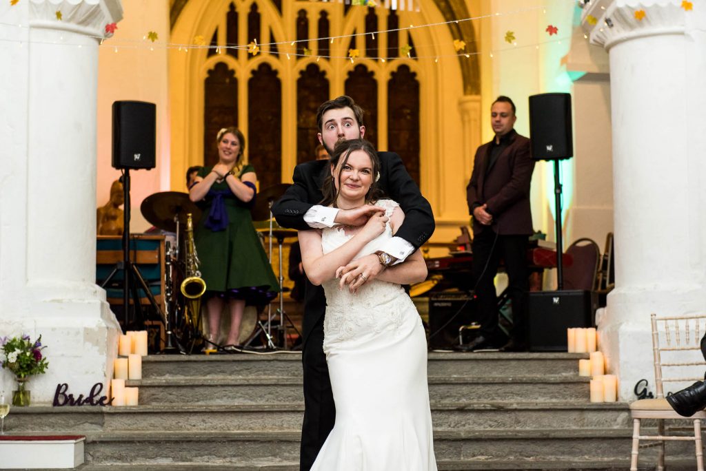 Bride and groom start their choreographed first dance