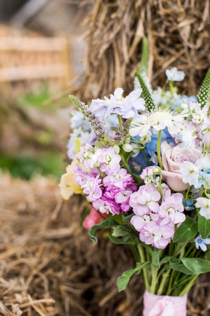 Soft pastel coloured floral arrangement for Surrey wedding styled shoot