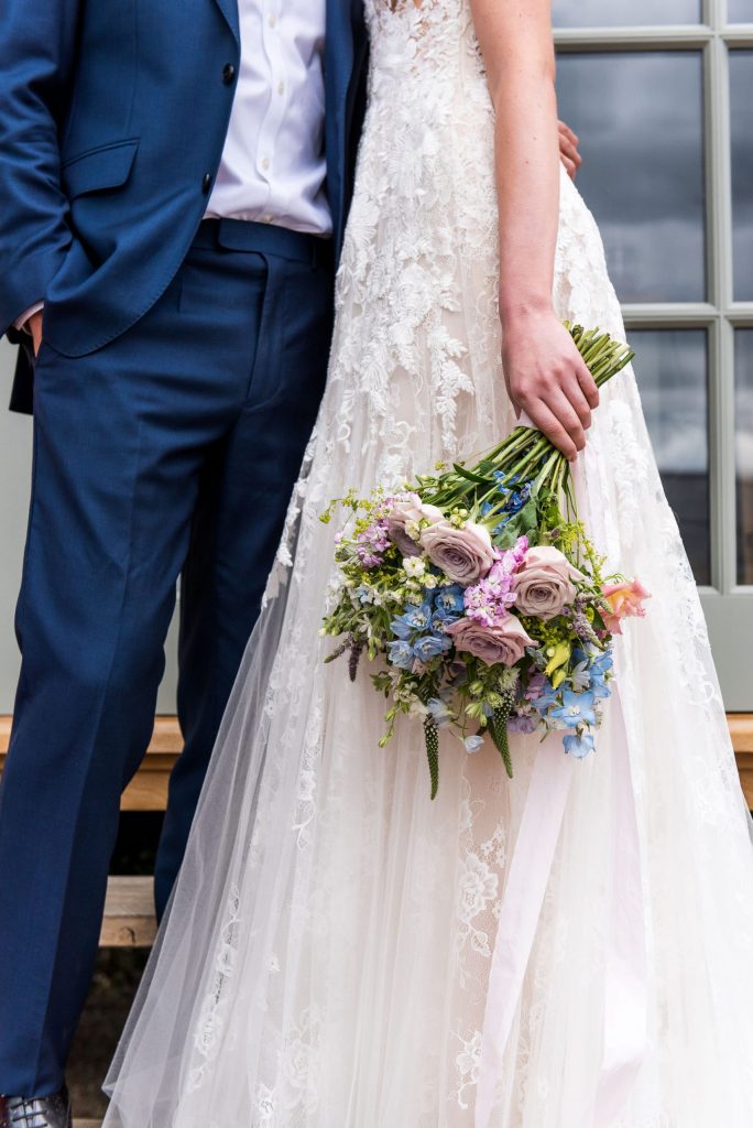 Stylish bridal bouquet of pastel flowers