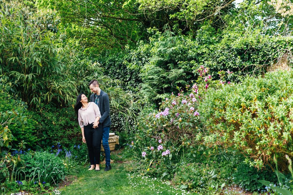Forty Hall Engagement shoot - engaged couple embrace in gorgeous foliage