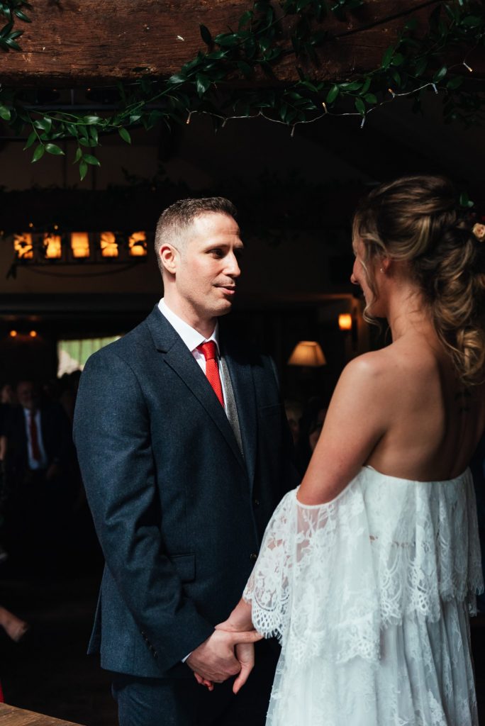 Handsome groom says his vows at the mill elstead