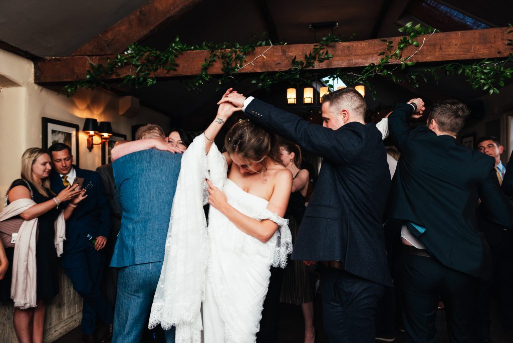 Couple share their first dance at their the mill at elstead wedding