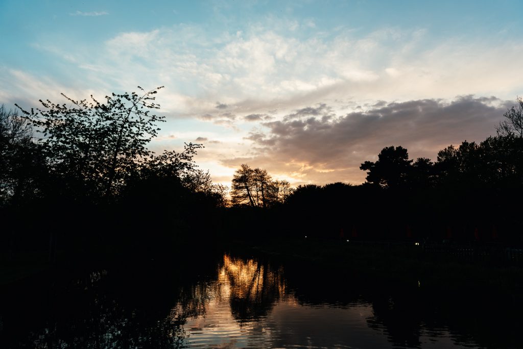 Sunset over the river at the mill at elstead