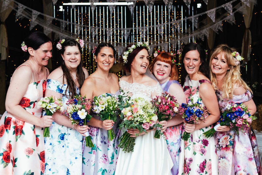 Fun and natural bride and bridesmaid group photography