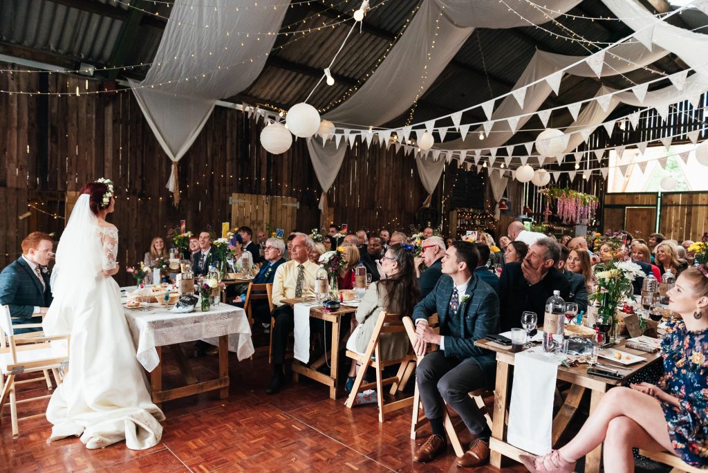 Bride speaks to the wedding crowd, Yorkshire wedding photography