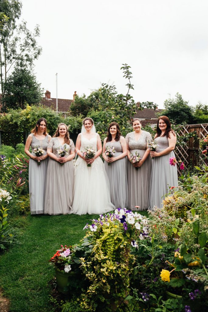 Bridesmaid portrait in beautiful English garden in Surrey
