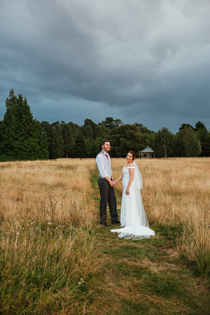 Dramatic sky with natural and candid couples portrait