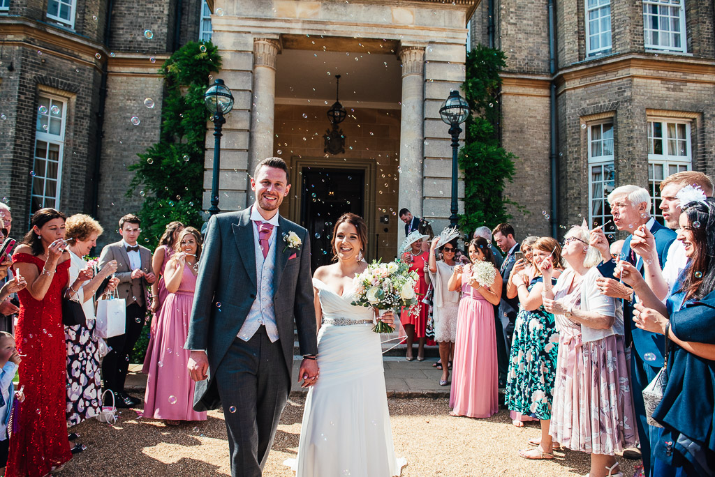 Bubble confetti exit for the bride and groom at Hedsor House