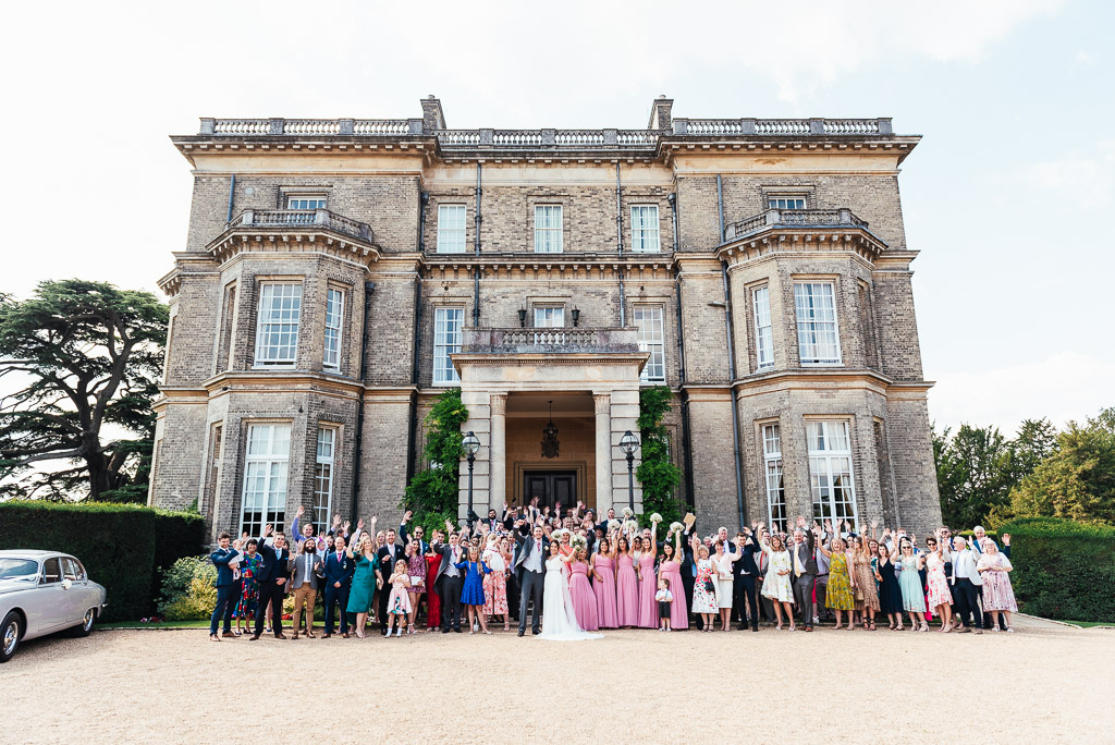 Group photograph of all the wedding guests at Hedsor House