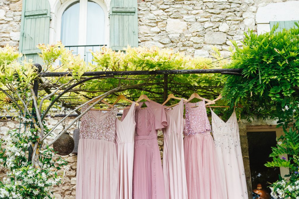 Miss matched bridesmaid dresses in shades of pink