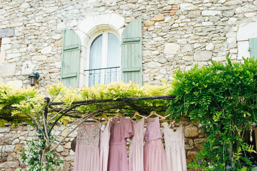 Miss matched bridesmaid dresses in shades of pink