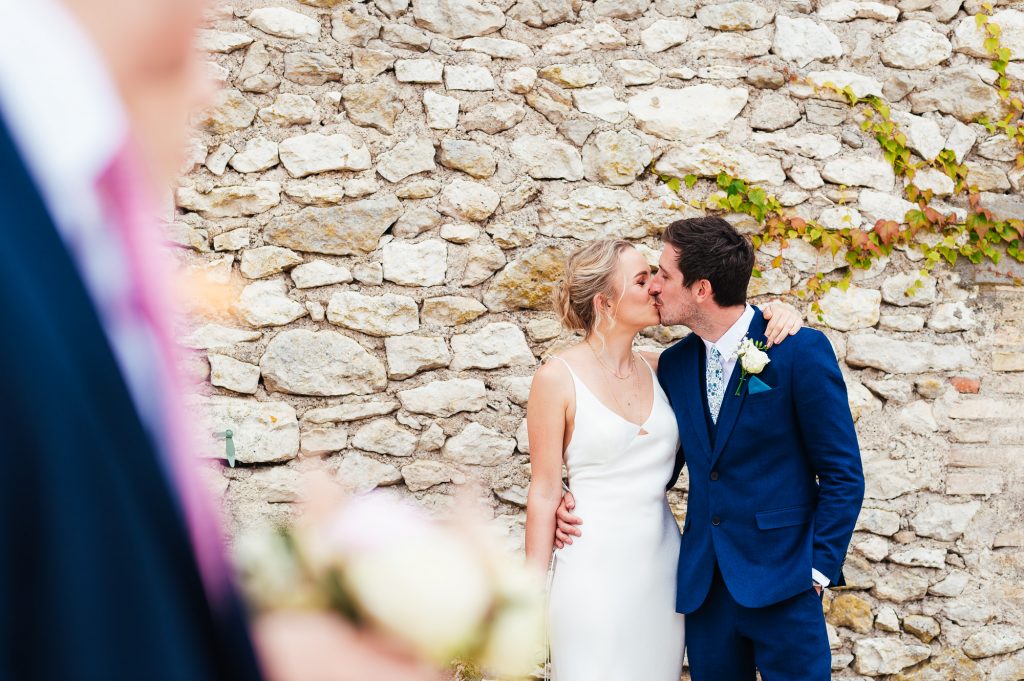 Outdoor French courtyard wedding couples portrait