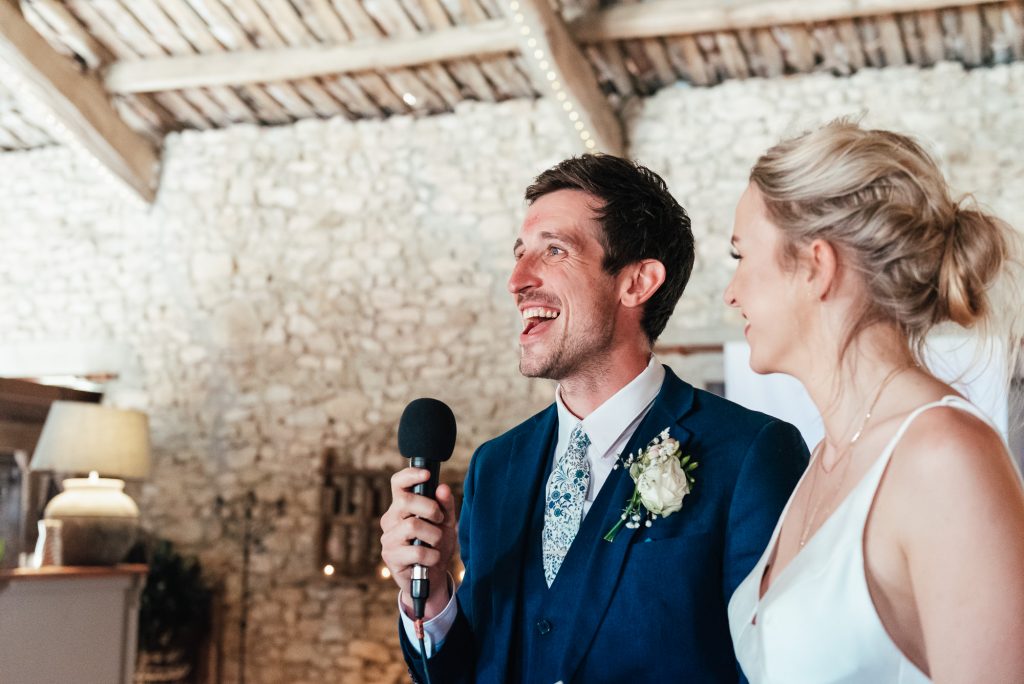 Bride and groom give a relaxed and emotive joint speech