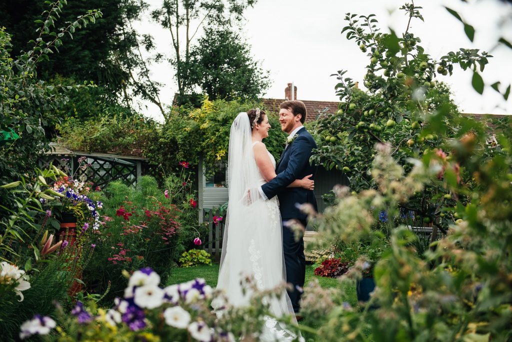 Outdoor wedding photography portrait in a summer Surrey garden