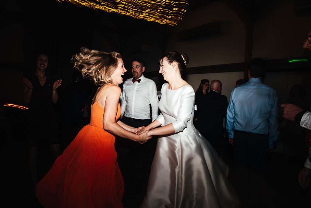 Lively ceilidh dance for a fun and natural Surrey wedding 