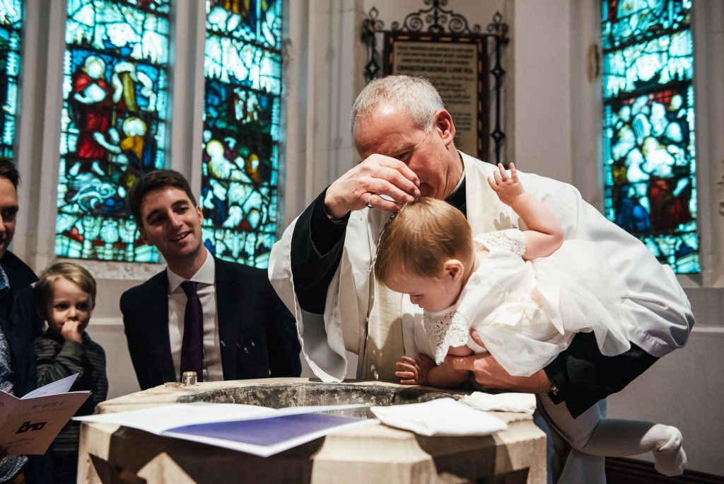 Baby is christened in Hertfordshire church