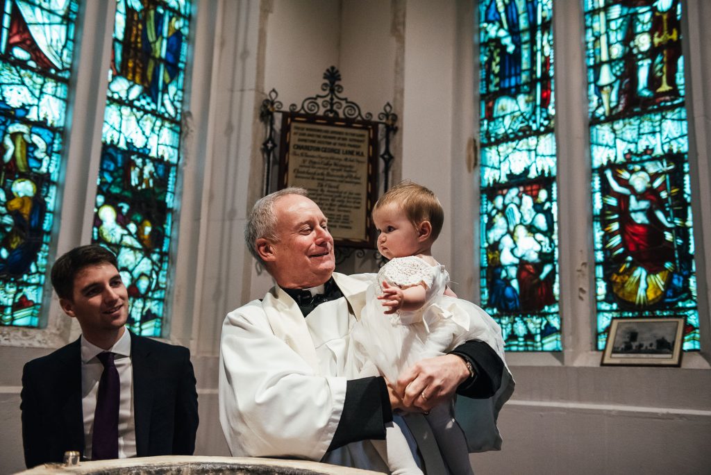 Baby is christened in Hertfordshire church