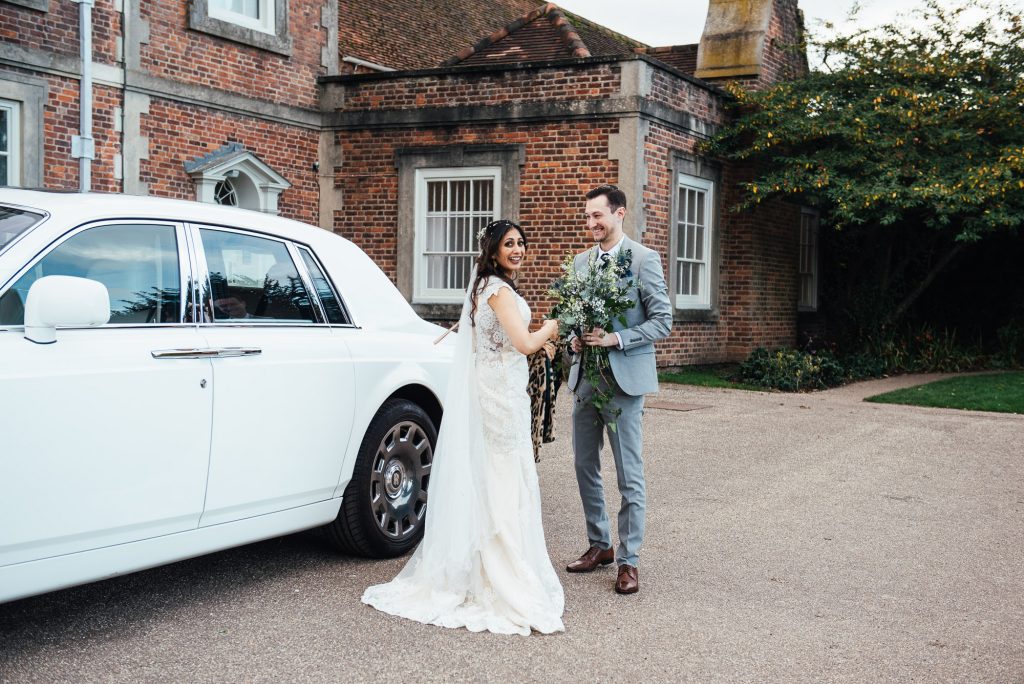 Couple arrive at Forty Hall for their reception