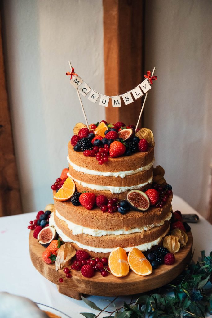 Beautiful three tiered naked autumnal wedding cake