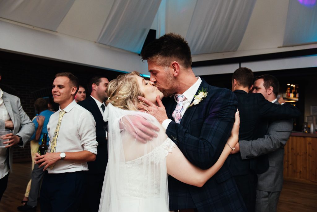 Bride and groom share a romantic first dance together