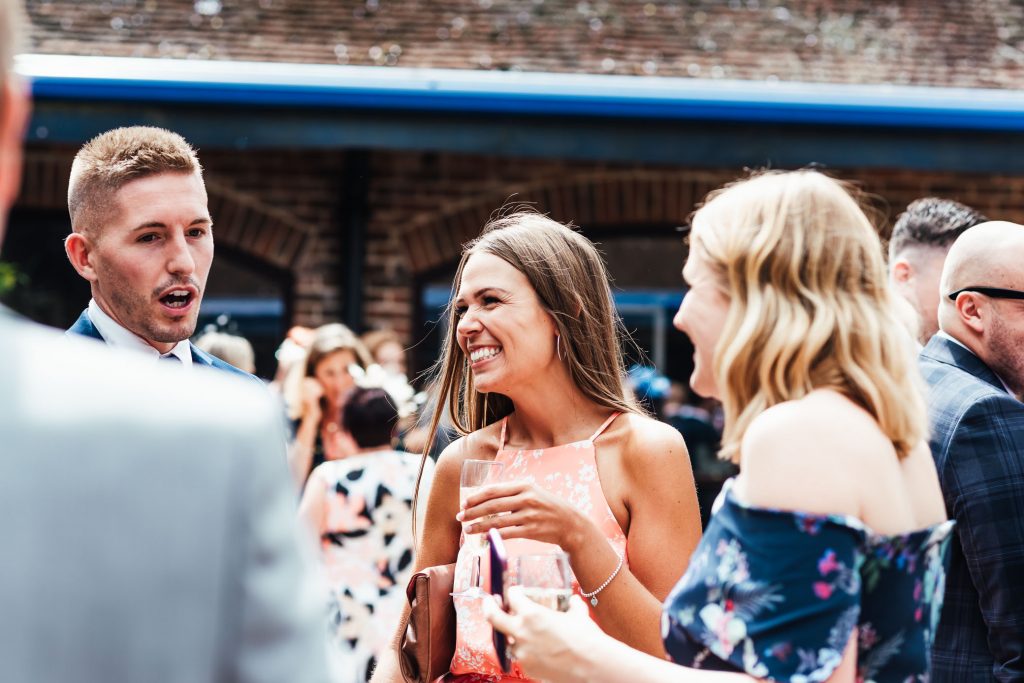 Candid wedding guest photography