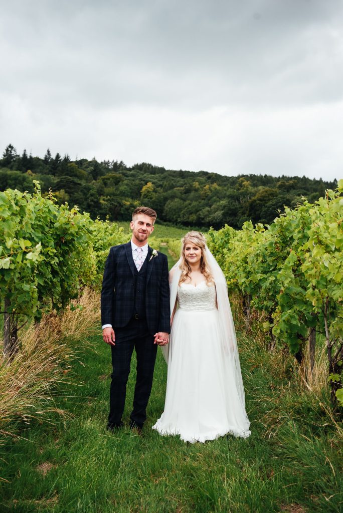 Outdoor Surrey vineyard wedding portrait
