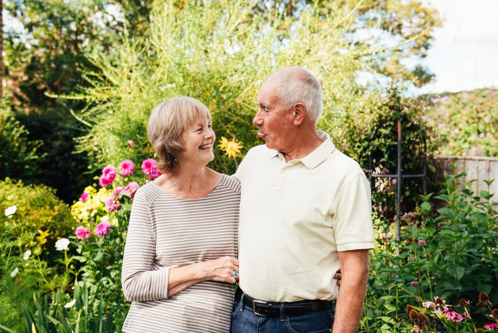 Candid portrait of the grandparents in the garden