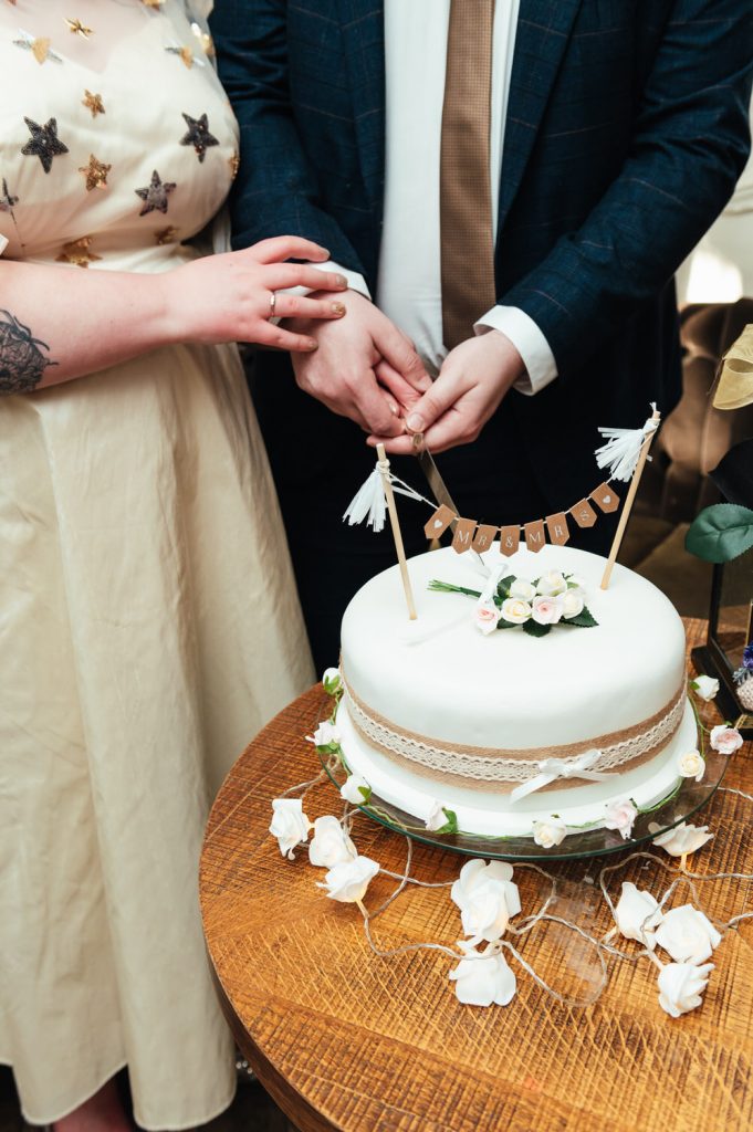 Weybridge Wedding Photography Cutting Cake