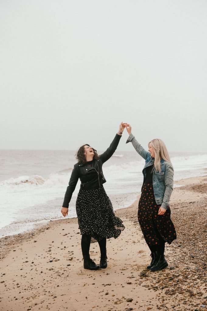 LGBT Couple Dance in The Rain, Beach Engagement Photography