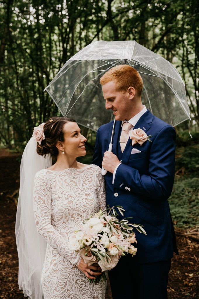 Rainy Wedding Portraits With Umbrella