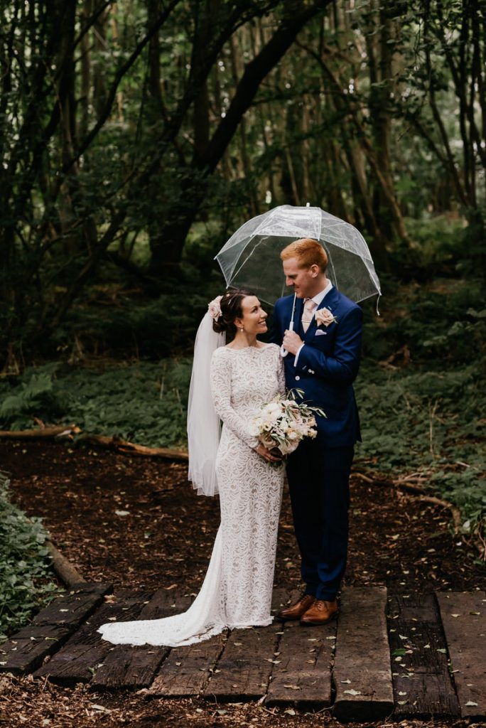 Classic Rainy Wedding Portraits With Umbrella