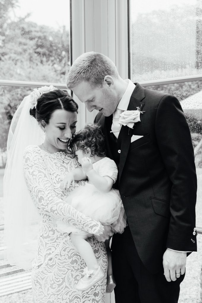 Black and White Natural Wedding Family Portrait, Outdoor Gate Street Barn Wedding
