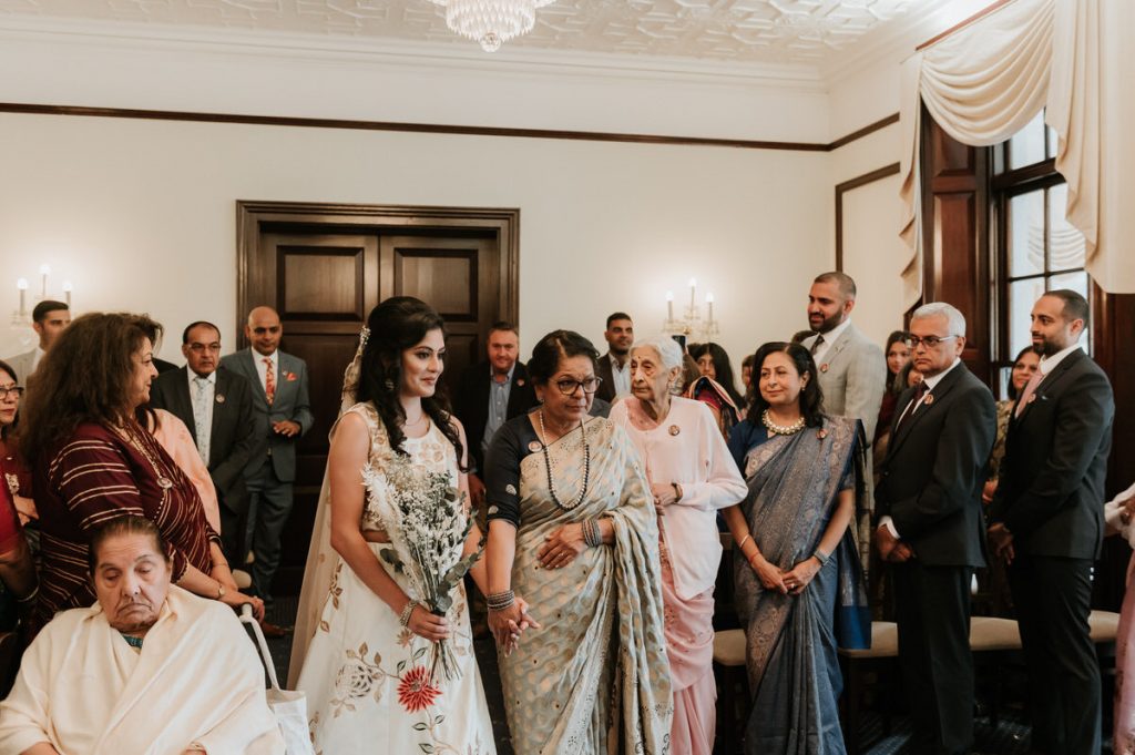 Mother and Daughter walk down the aisle together