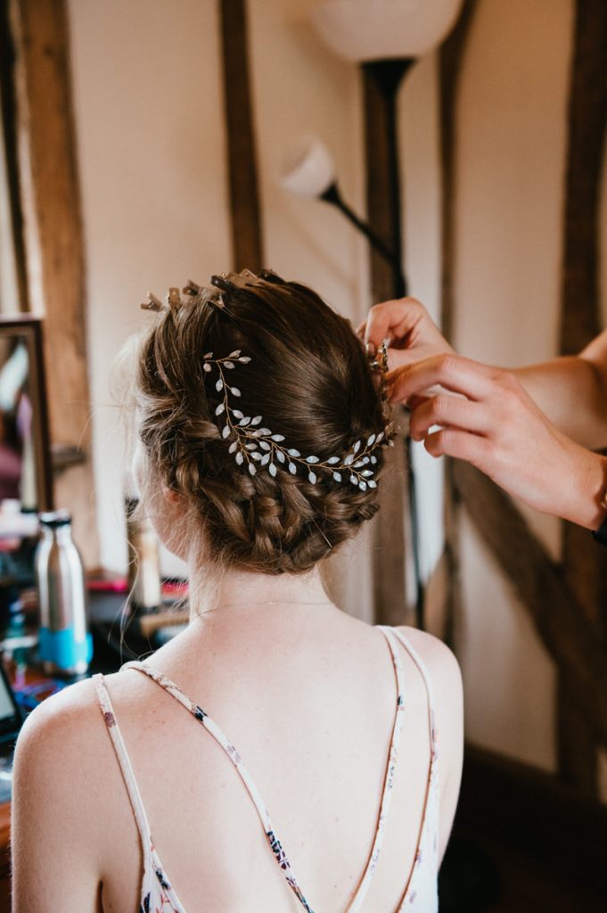 Bridesmaid Helps With Bridal Hair Preparation