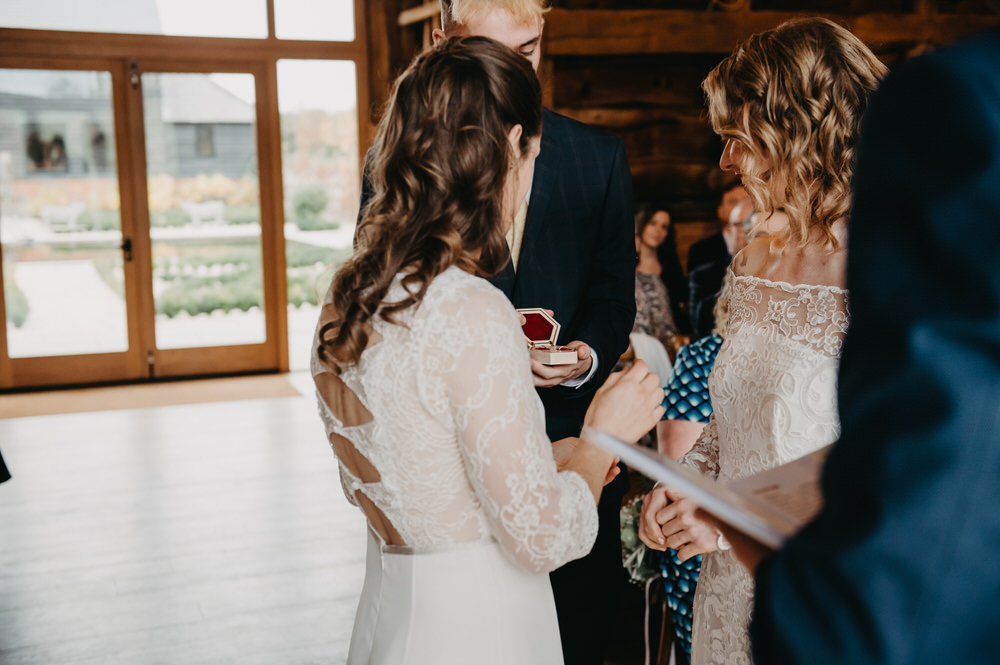 Couple Exchange Rings During Ceremony, Silchester Farm Wedding