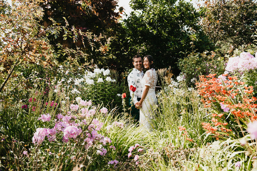 Couple Have Portraits in Brides Grandad's Flower Garden