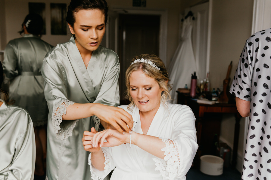 Candid Bridesmaid and Bride Photography During Preparation