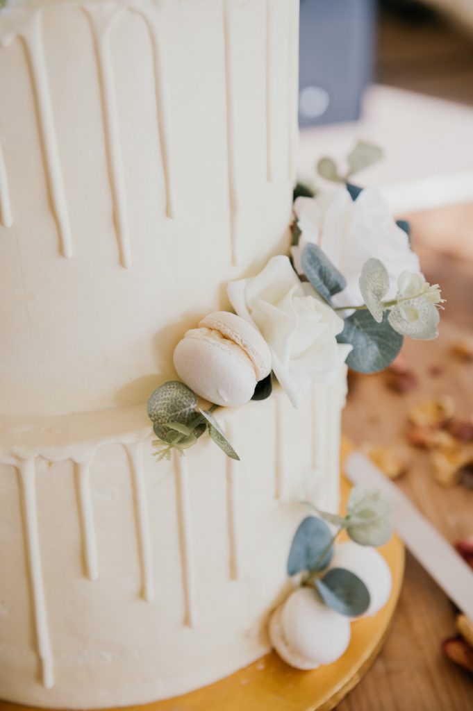 Home Made Three Tier Wedding Cake With Macaroon Decoration
