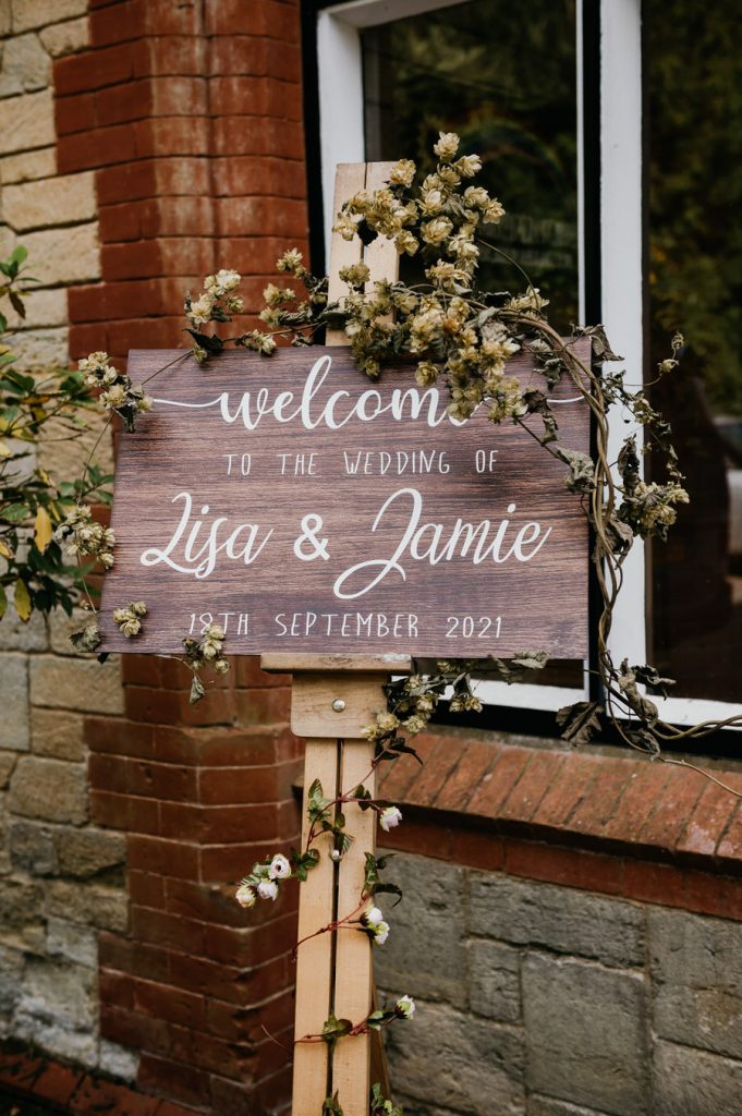Rustic Welcome Sign for Outdoor Surrey Marquee Wedding