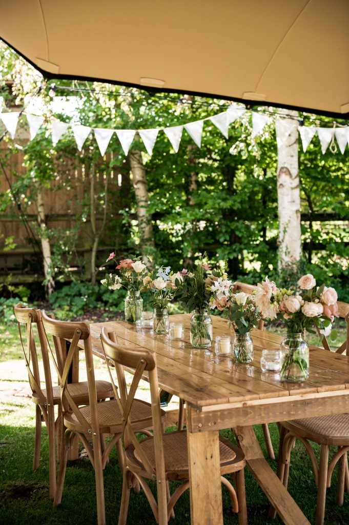 Rustic and Relaxed Garden Marquee Wedding Table Set Up