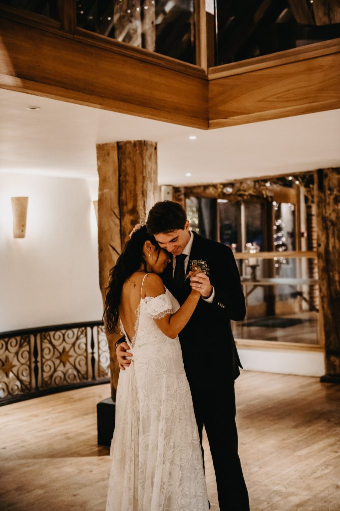 Couple share an intimate first dance together.