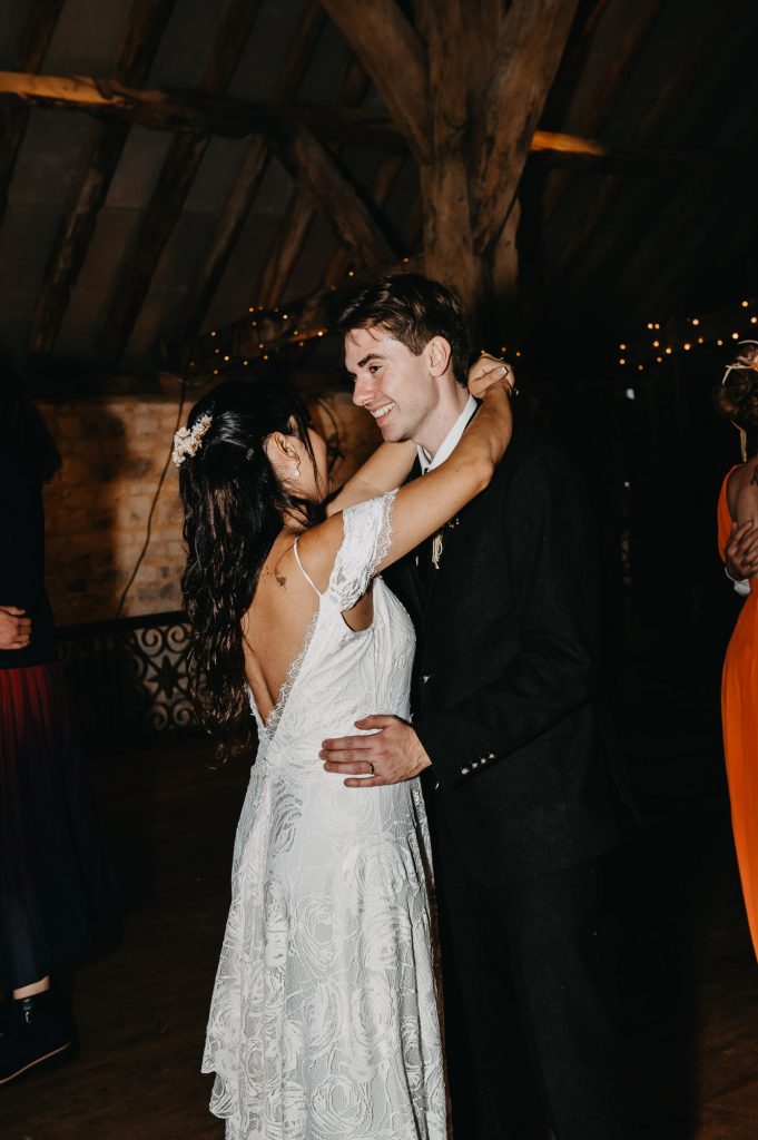 First Dance Photography with Direct Flash - Couple Dance with Arms Around Each Other