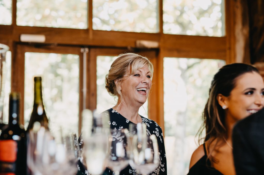 Guests Smile and Laugh During Wedding Speeches