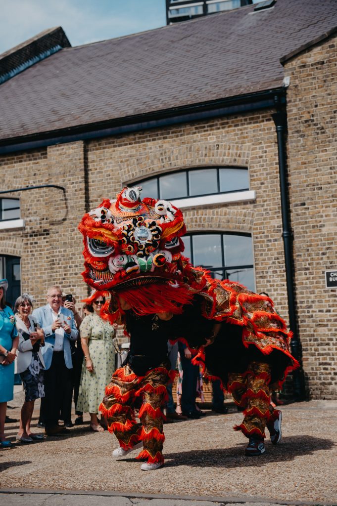 Couple Watch Dragon Dance During Chinese Wedding Day Tradition
