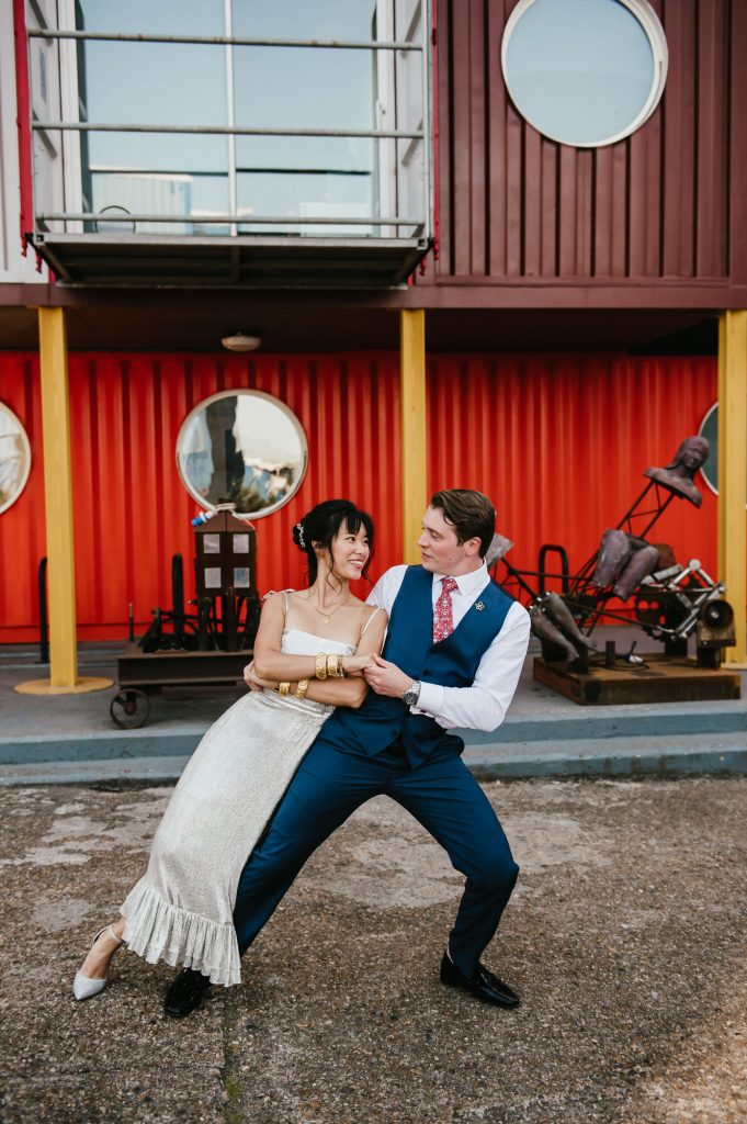 Couple Dance Together Outside During Couples Wedding Portraits