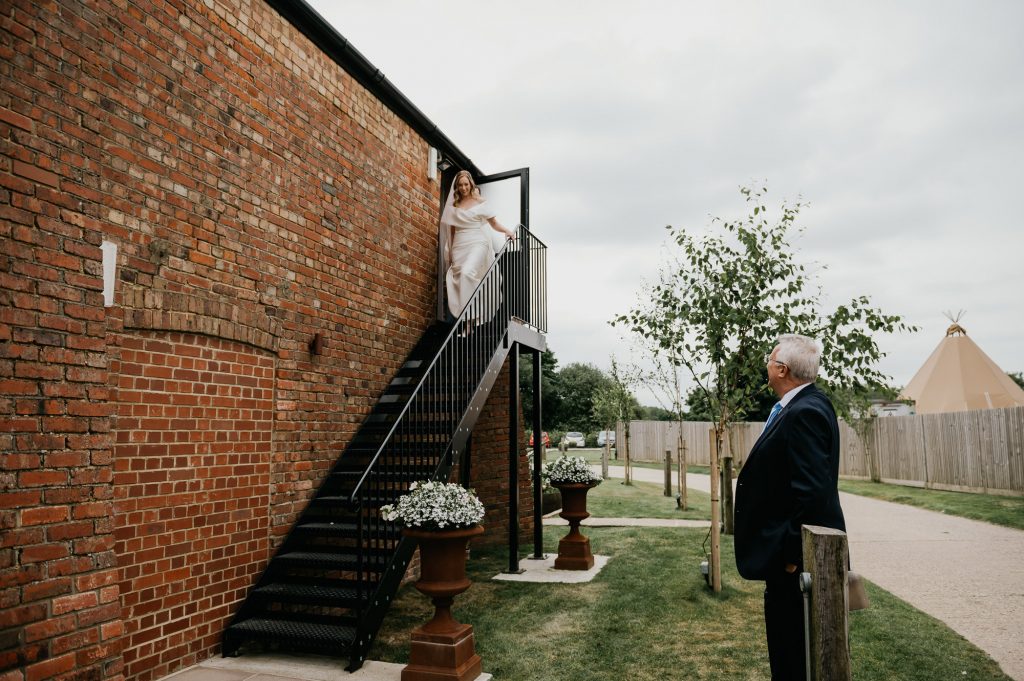 First look reveal with the father of the bride - The Barn at Botley Hill wedding