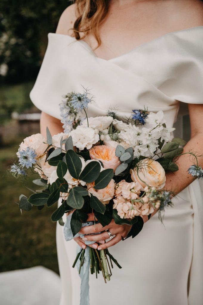 Soft colour palette wedding bouquet, pastel pinks, whites and blues. 